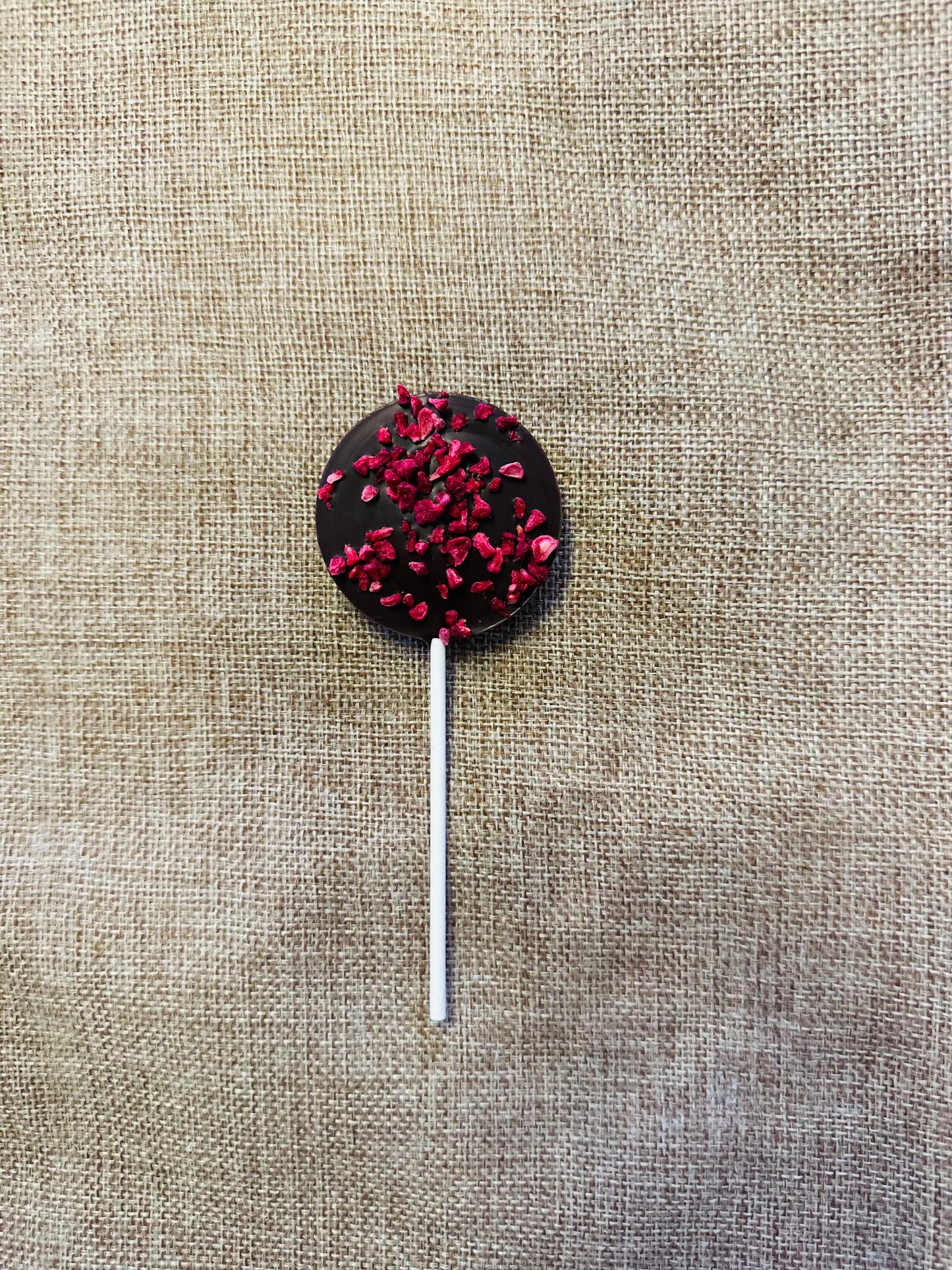 DARK CHOCOLATE LOLLIPOP with raspberry